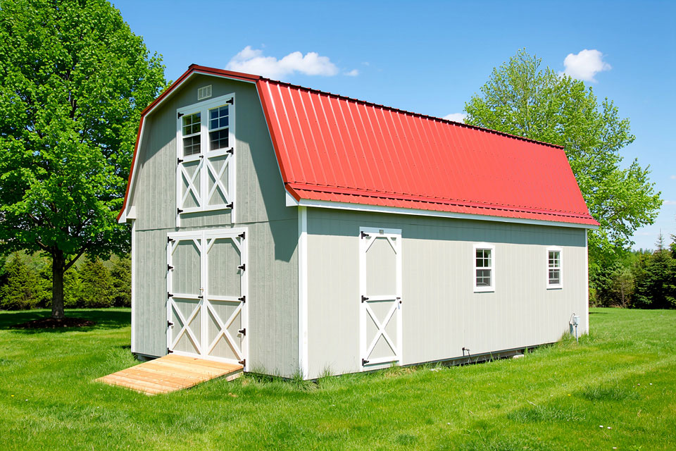 Light gray modular garage with white trim.
