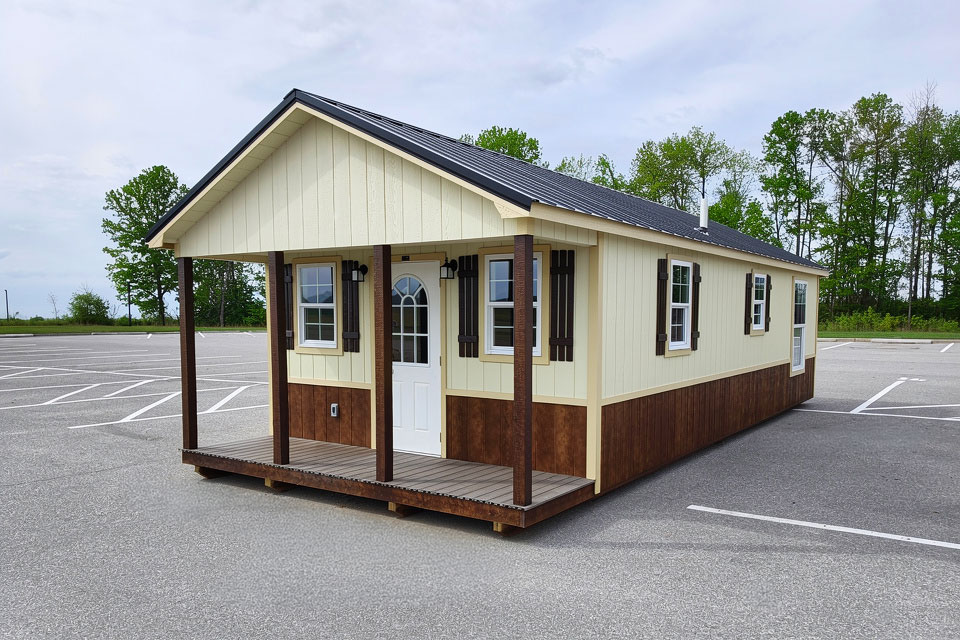 Finished Portable Cabins: Yellow with light brown trim.
